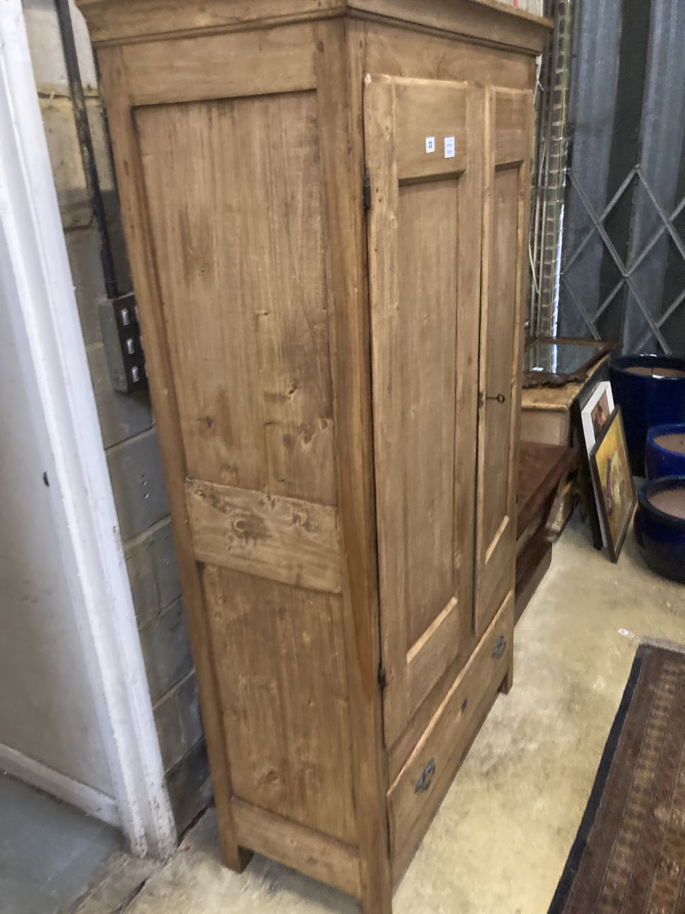 A 19th century French pine two door armoire, width 105cm depth 49cm height 195cm